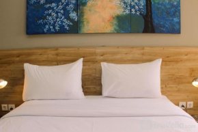 Stunning and Comfortable 1BR Apartment Mustika Golf Residence By Travelio